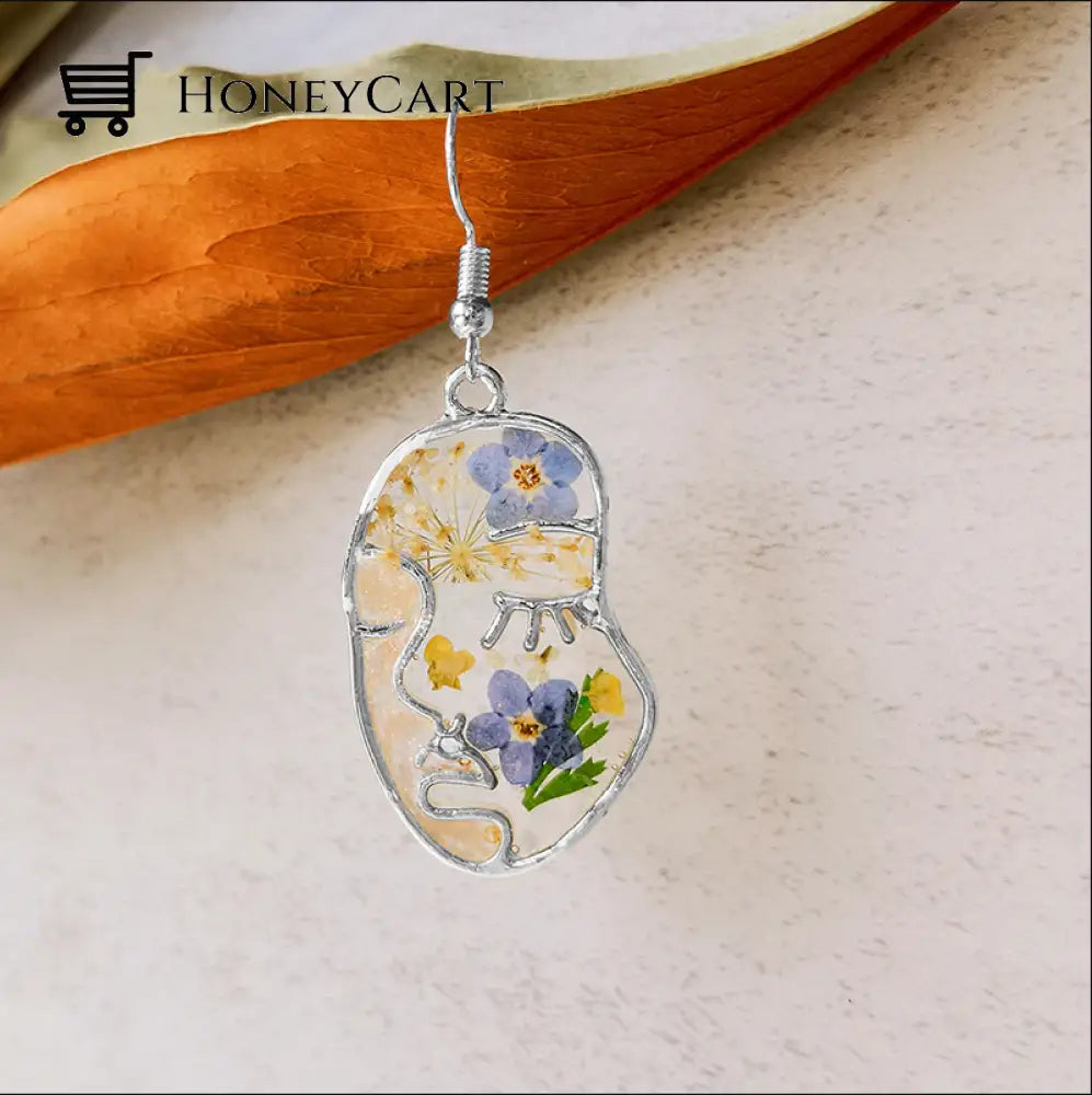 Abstract Face Forget Me Not Flower Earrings Silver Tool
